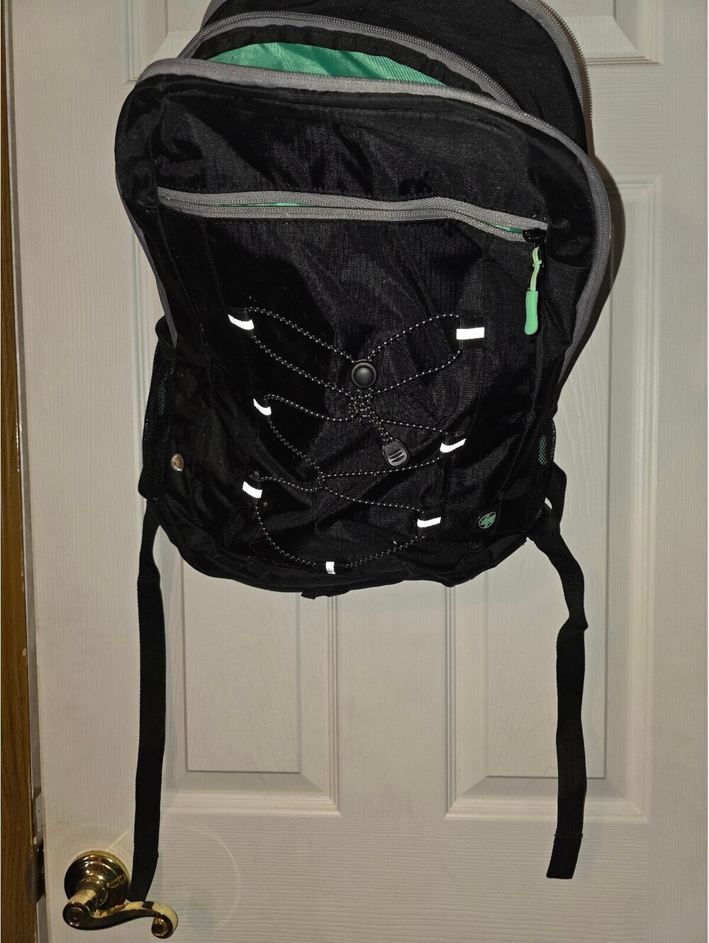 HP Black backpack with green lining